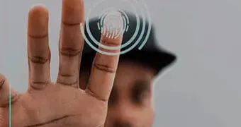 A man displaying his finger with a fingerprint.