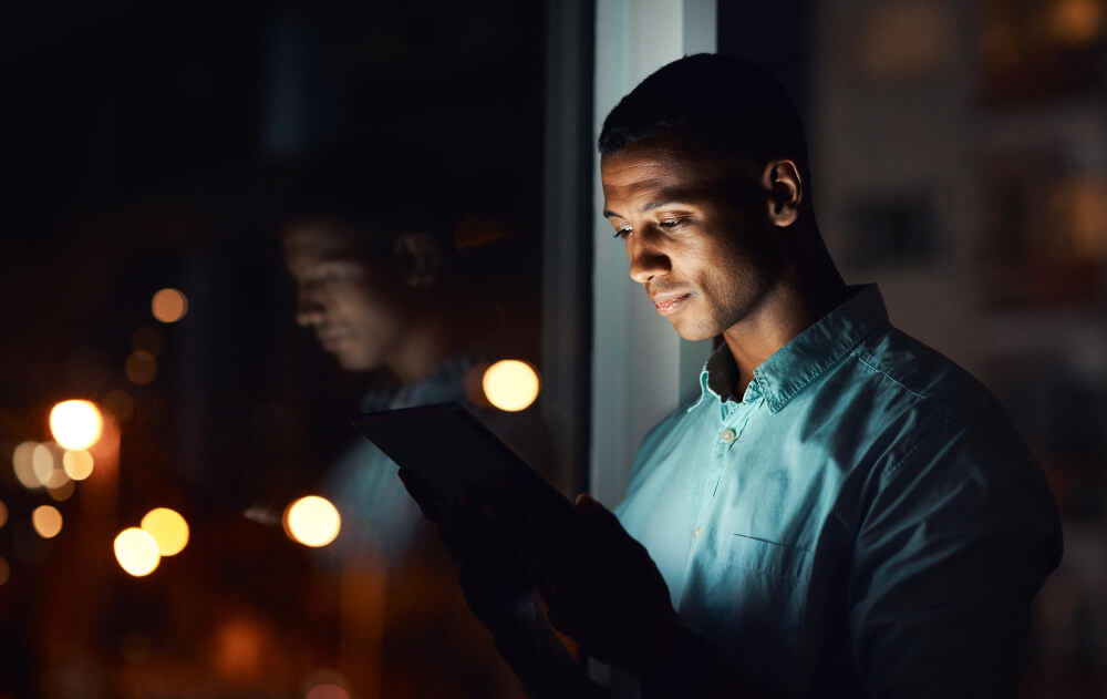 Handsome Young Businessman Using Digital Tablet.